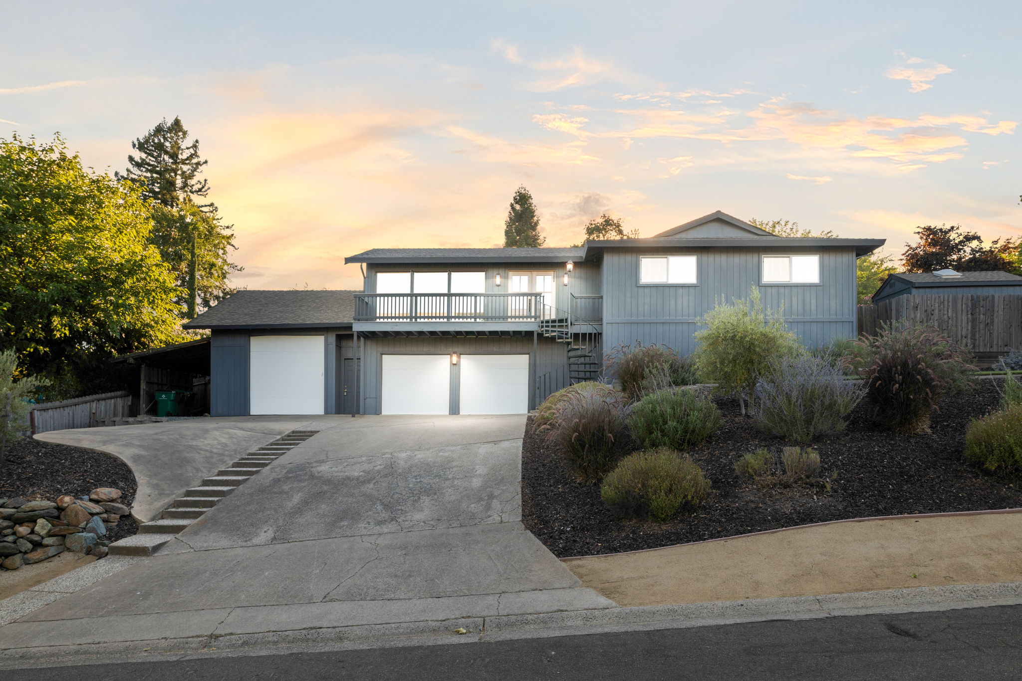 Twilight exterior with pool